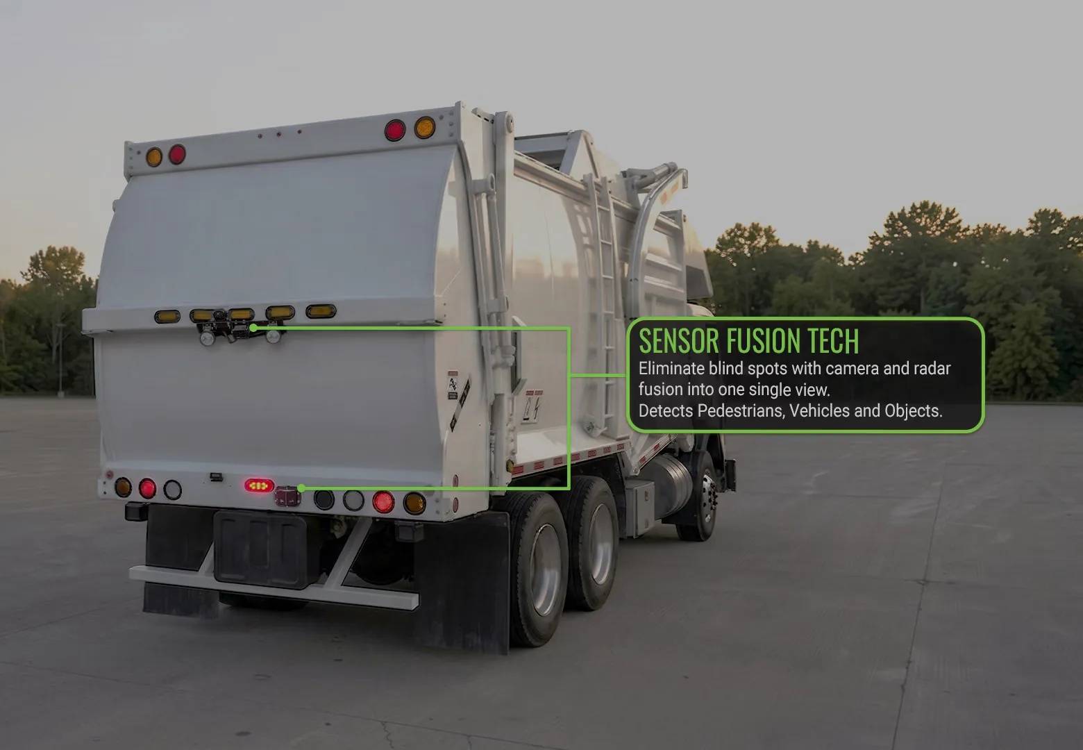 Rear of a waste truck with its camera and radar sensors marked: sensor fusion technology combines them into one single view that detects pedestrians, vehicles, and objects.
