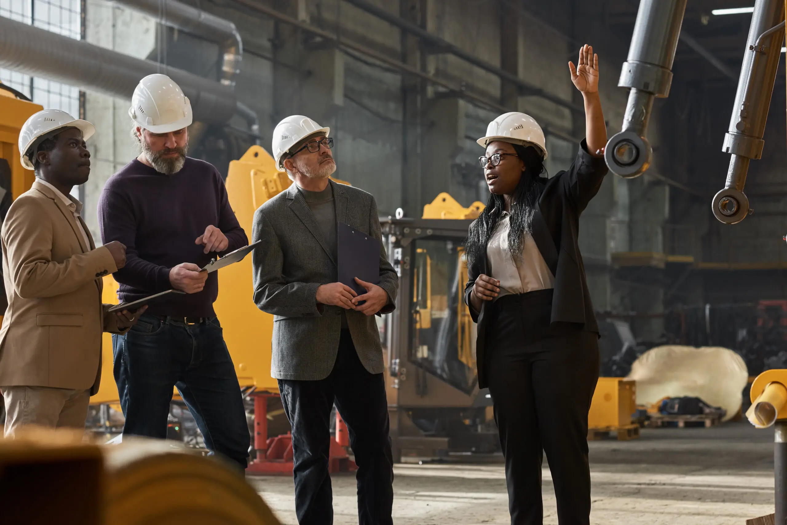 Safety manager explaining equipment and workplace injury prevention