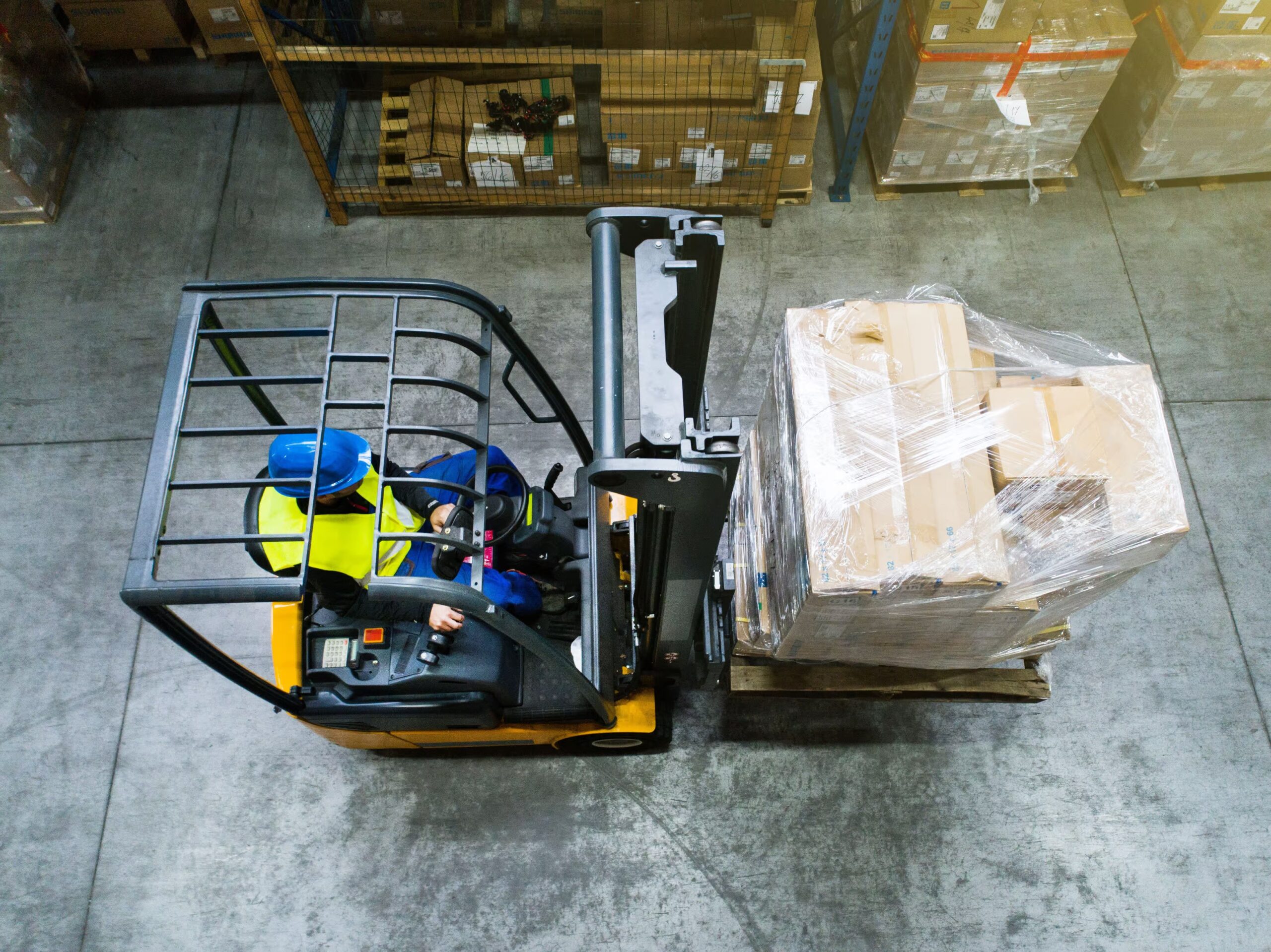 forklift in a warehouse with boosted safety