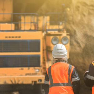 two workers working on an aggregate site