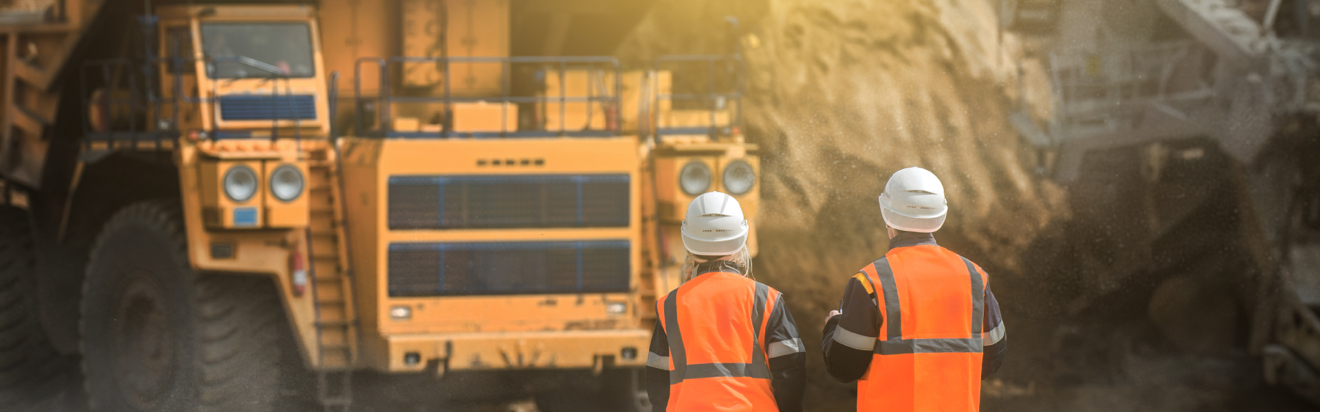 two workers working on an aggregate site