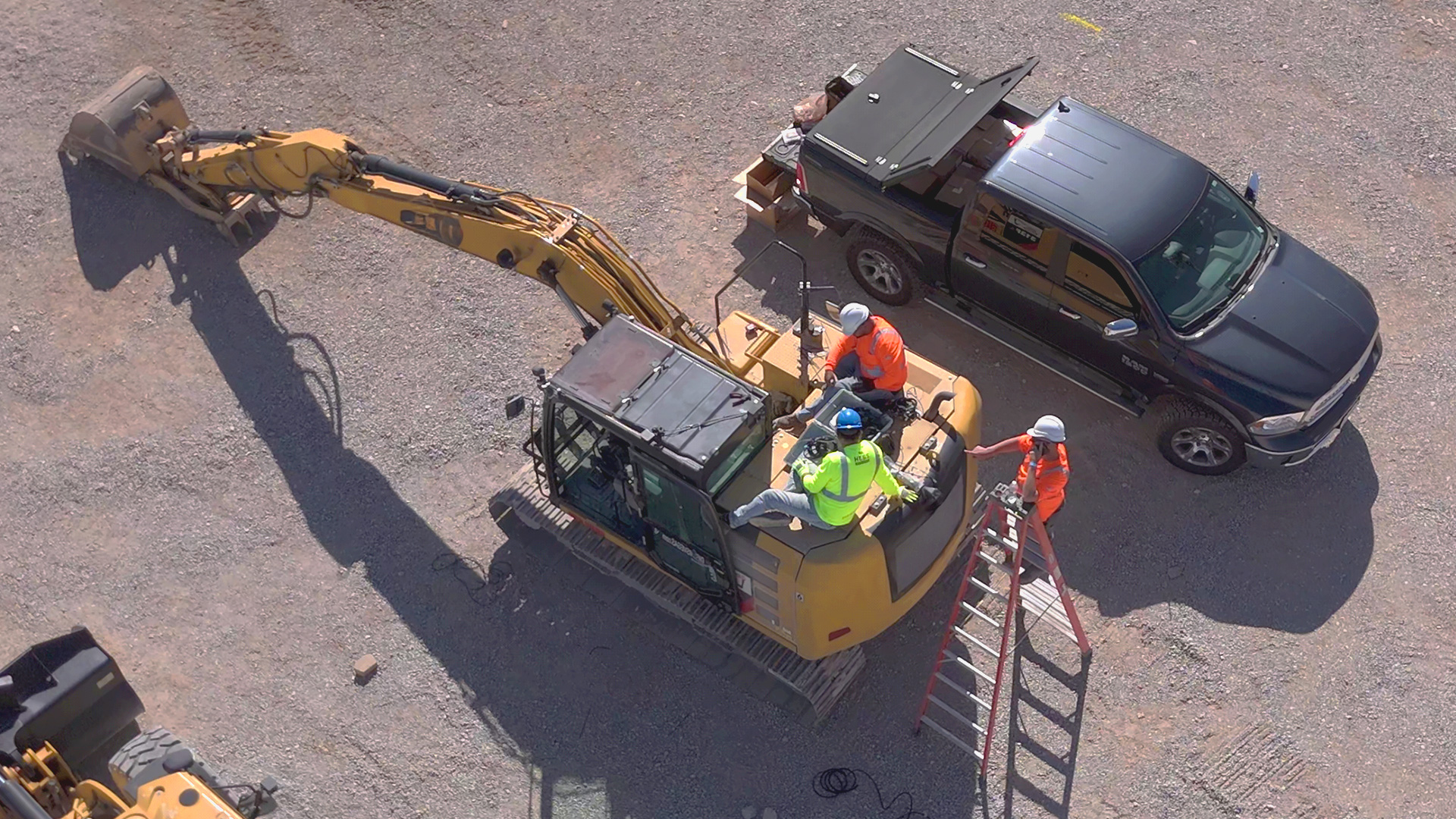 certified installers on an excavator