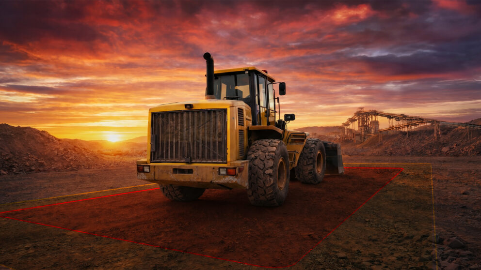 loader with detection zones surrounding the vehicle